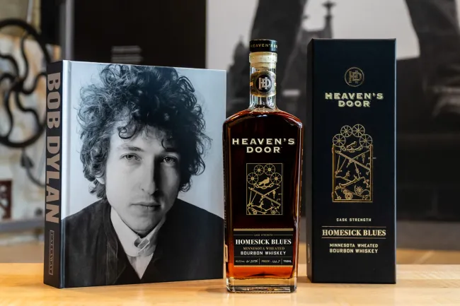 Bob Dillian's brand, Heaven's Door, pictured with anthology image and bottle.